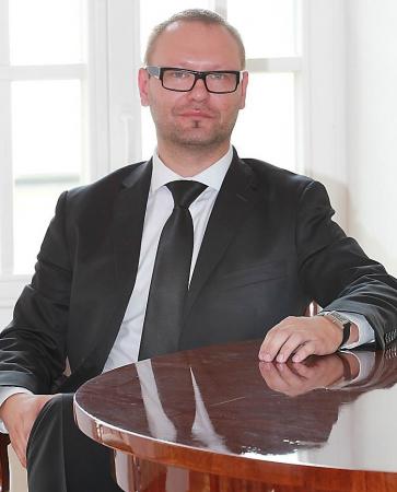 Ekspert rynku nieruchomości gruntowych, Grzegorz Rutkowski - prezes serwisu AukcjeZiemi.pl