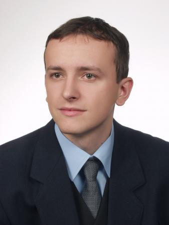 Przemysław Knura Senior Product Manager w firmie D+H  Polska.